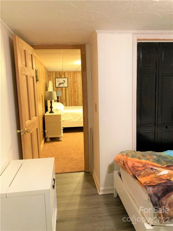 268 Sasafras Ridge Rutherfordton, NC 28139 - Photo 31 of 48 a bedroom with a bed and wooden floor