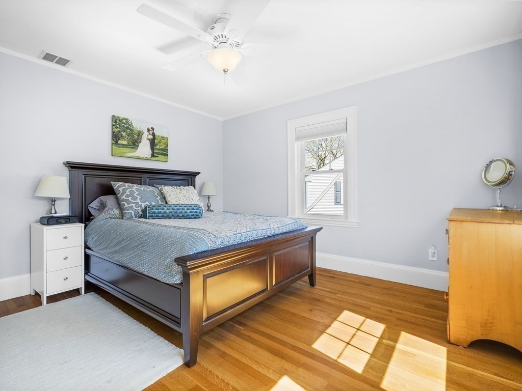 21 Normandy Road Newton, MA 02466 - Photo 13 of 36 a bedroom with a bed and a window