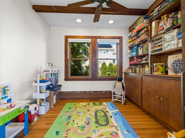 a bed room with a bed and a window