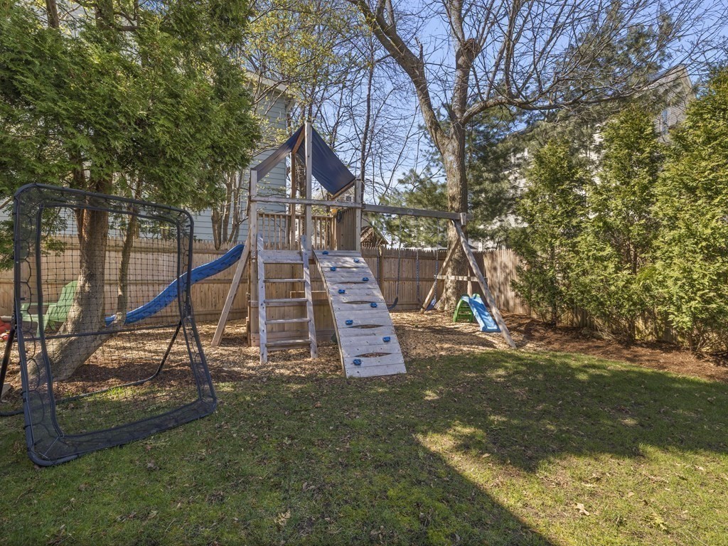 21 Normandy Road Newton, MA 02466 - Photo 28 of 36 a view of a house with a park