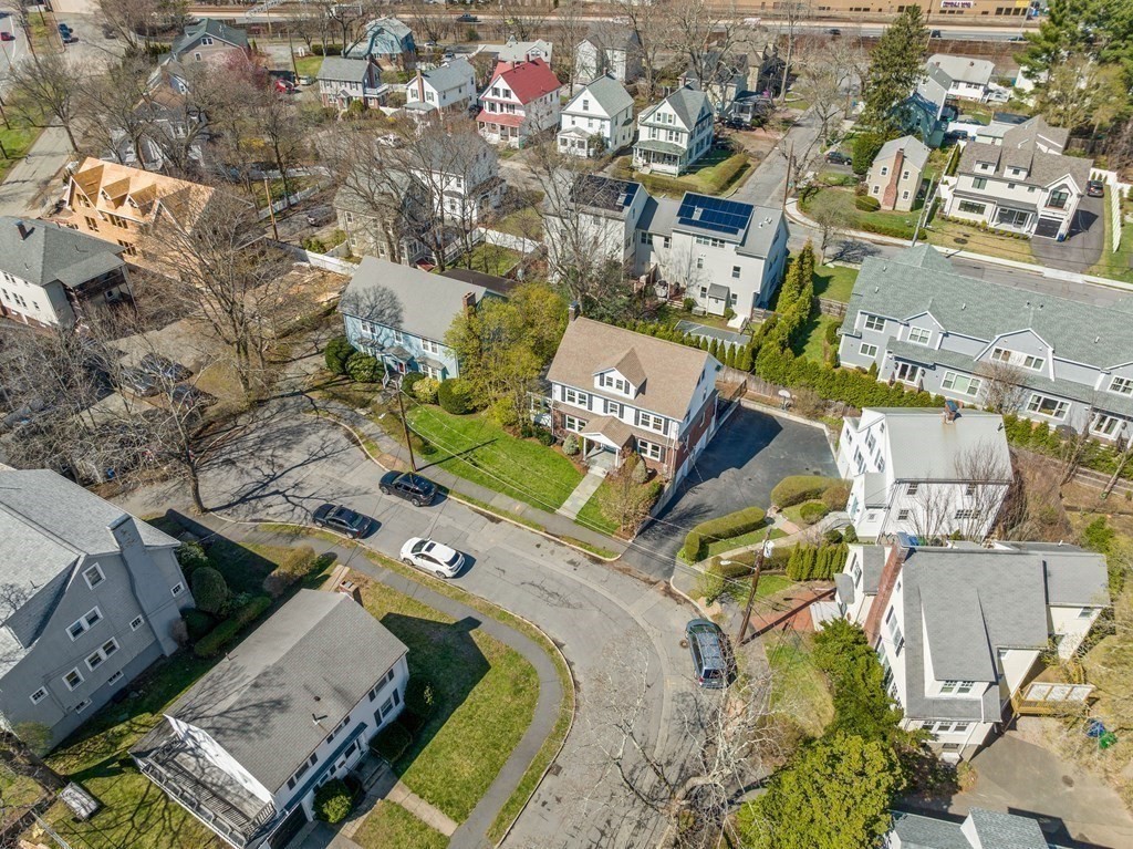 21 Normandy Road Newton, MA 02466 - Photo 32 of 36 an aerial view of a house with a swimming pool