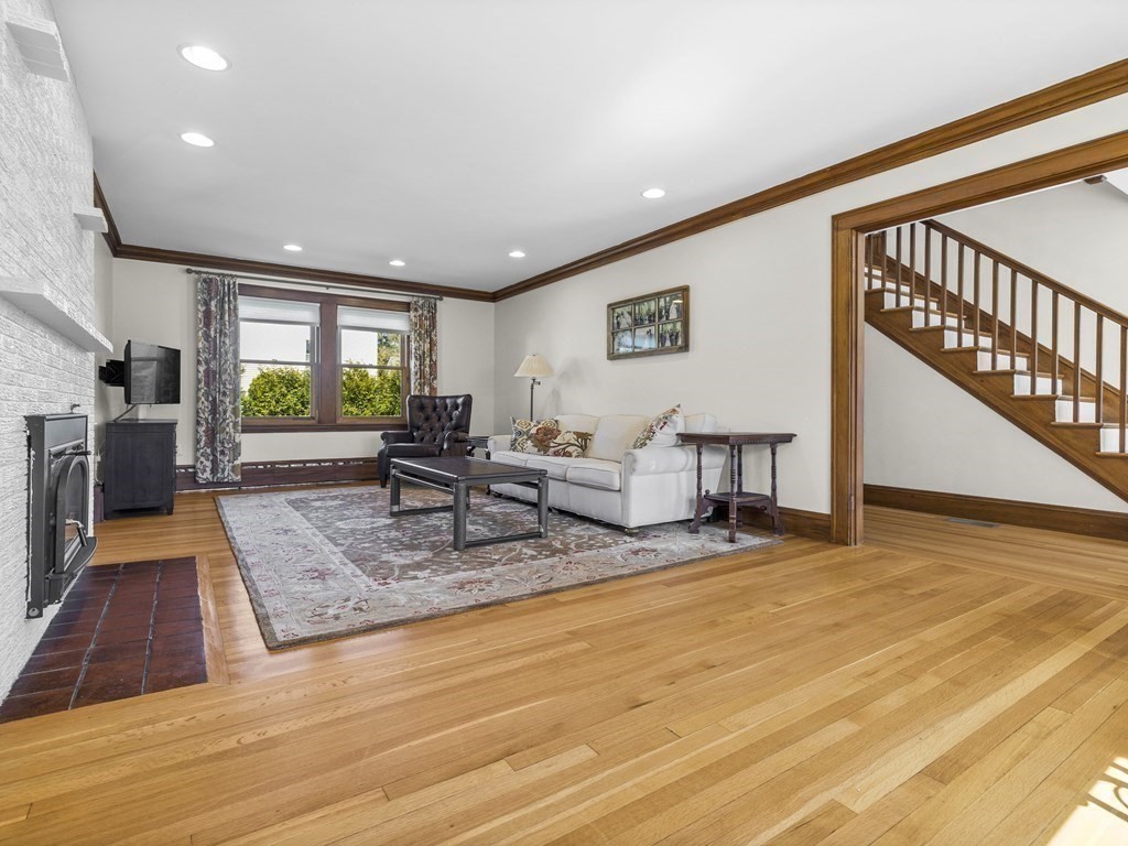 21 Normandy Road Newton, MA 02466 - Photo 4 of 36 a living room with furniture and a wooden floor