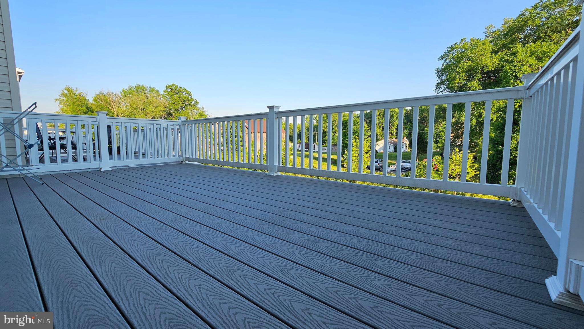 2055 Rivers Drive Newark, DE 19702 - Photo 26 of 48 a view of deck with wooden floor and fence with a garden