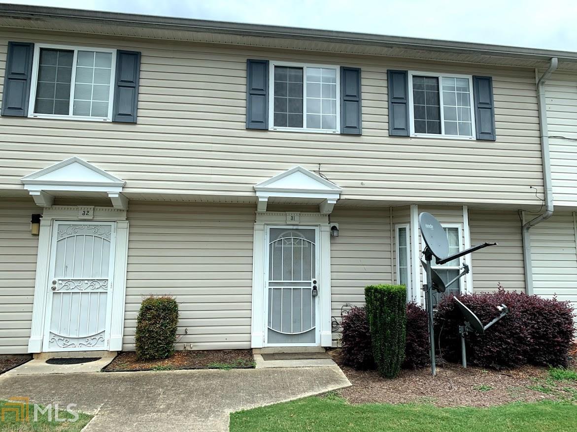 1625 Conley Road, Unit 31 Conley, GA 30288 - Photo 1 of 1 a front view of a house
