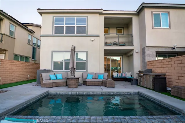 a house view with sitting space and garden space