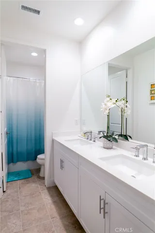 a view of a chairs and table in patio