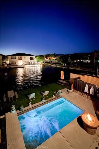 a bathroom with a toilet a sink and a window