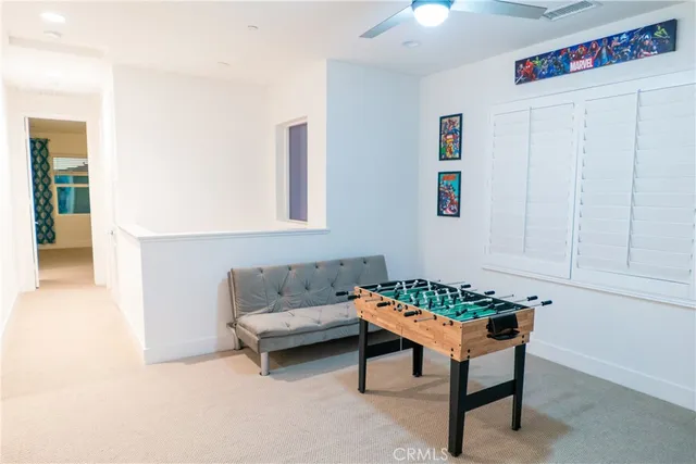 a view of house with yard and ocean view