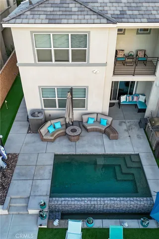 a view of a swimming pool with a garden