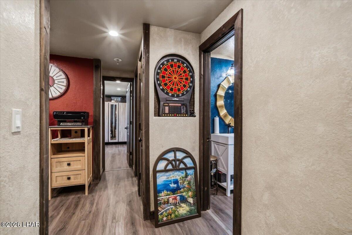 3170 Parker Dam Road, Unit 18 Parker, AZ 85344 - Photo 17 of 88 See the dart board behind the painting