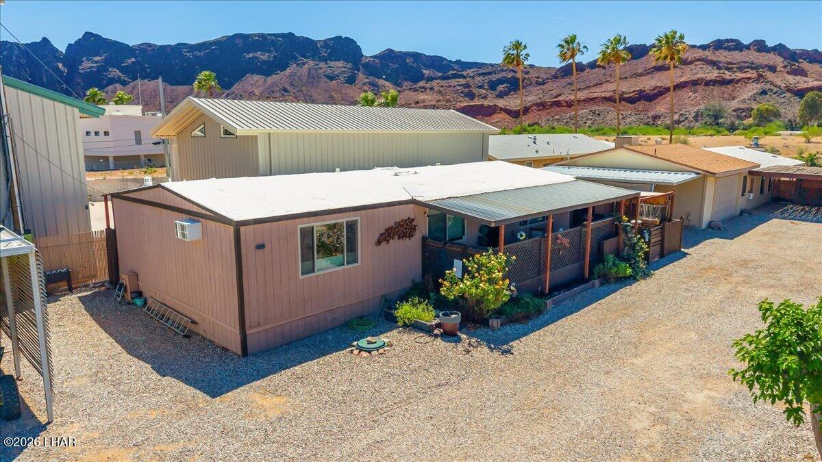 3170 Parker Dam Road, Unit 18 Parker, AZ 85344 - Photo 77 of 88 a aerial view of a house with a yard