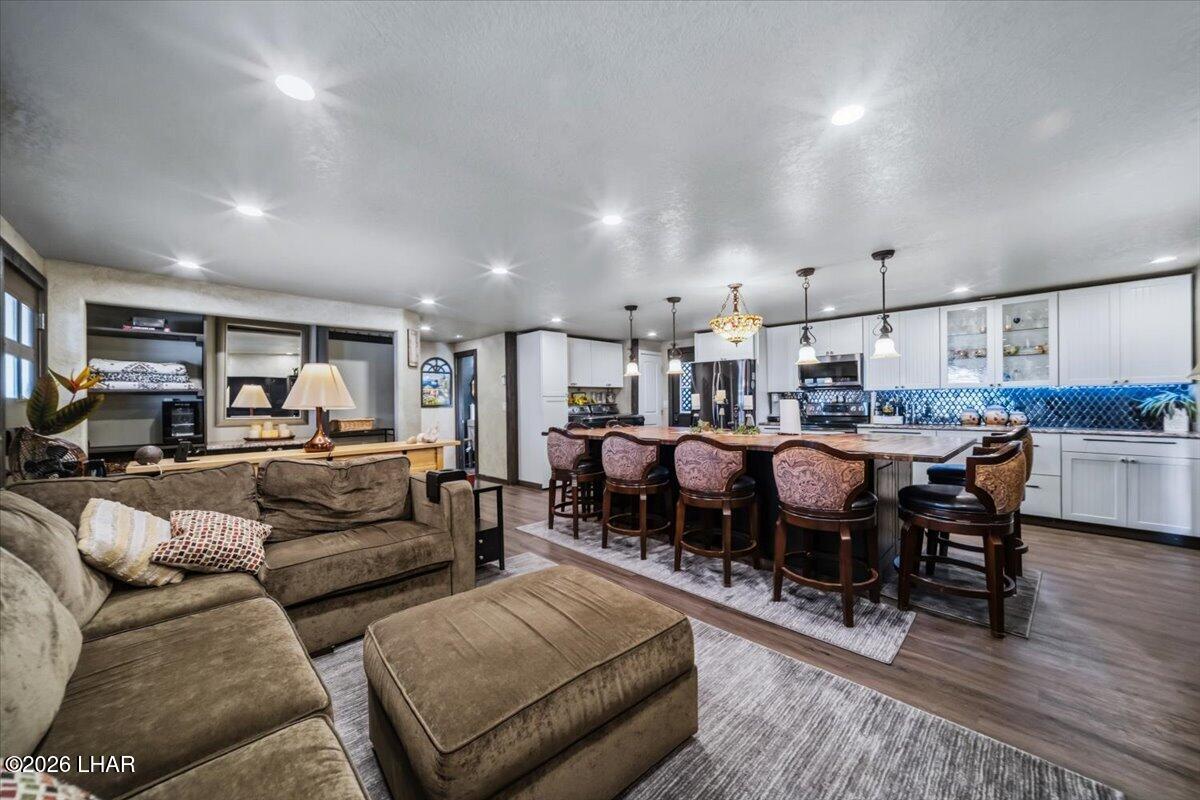 3170 Parker Dam Road, Unit 18 Parker, AZ 85344 - Photo 88 of 88 a living room with lots of furniture and kitchen view