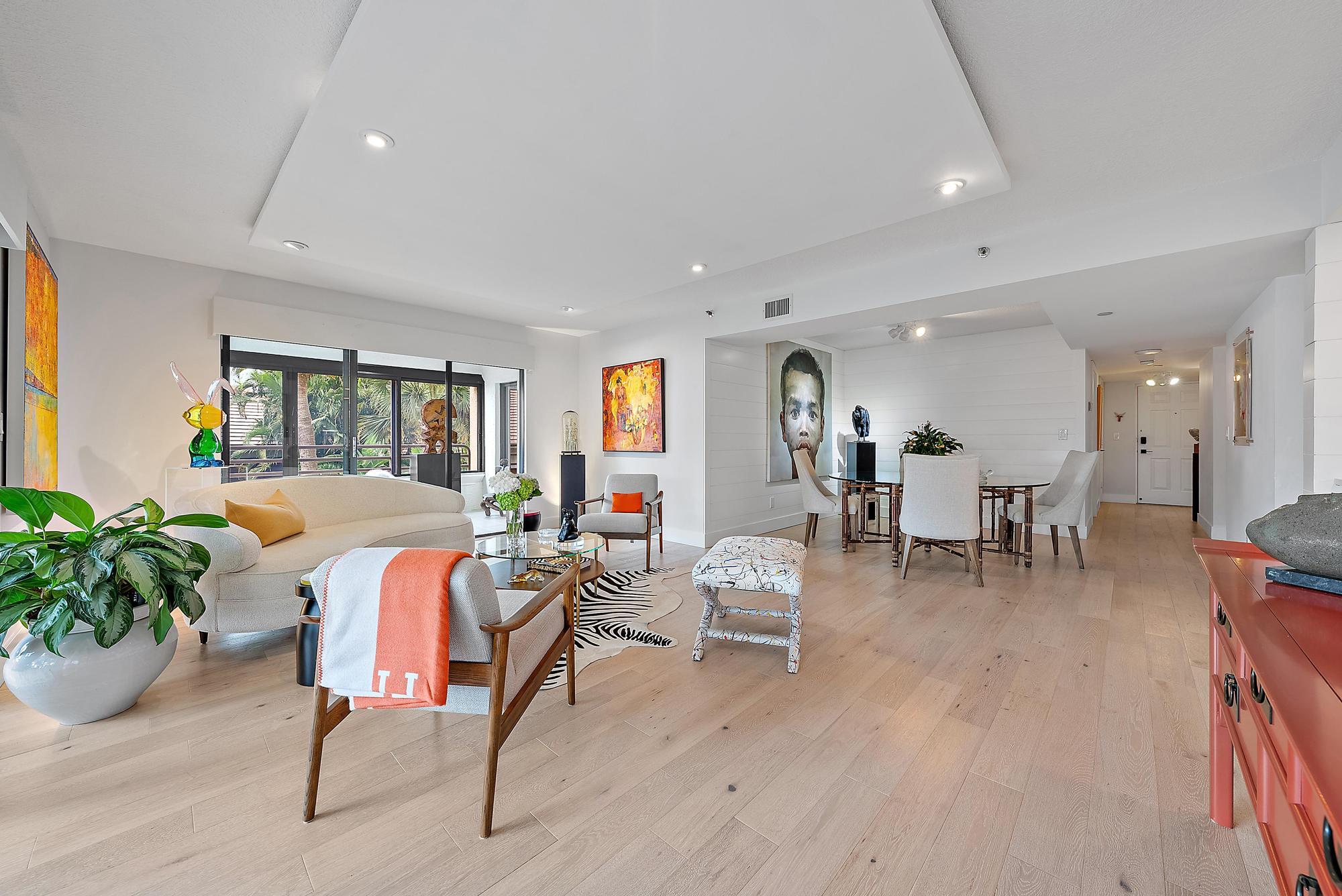 326 Oak Harbour Drive Juno Beach, FL 33408 - Photo 27 of 41 a living room with furniture and a potted plant