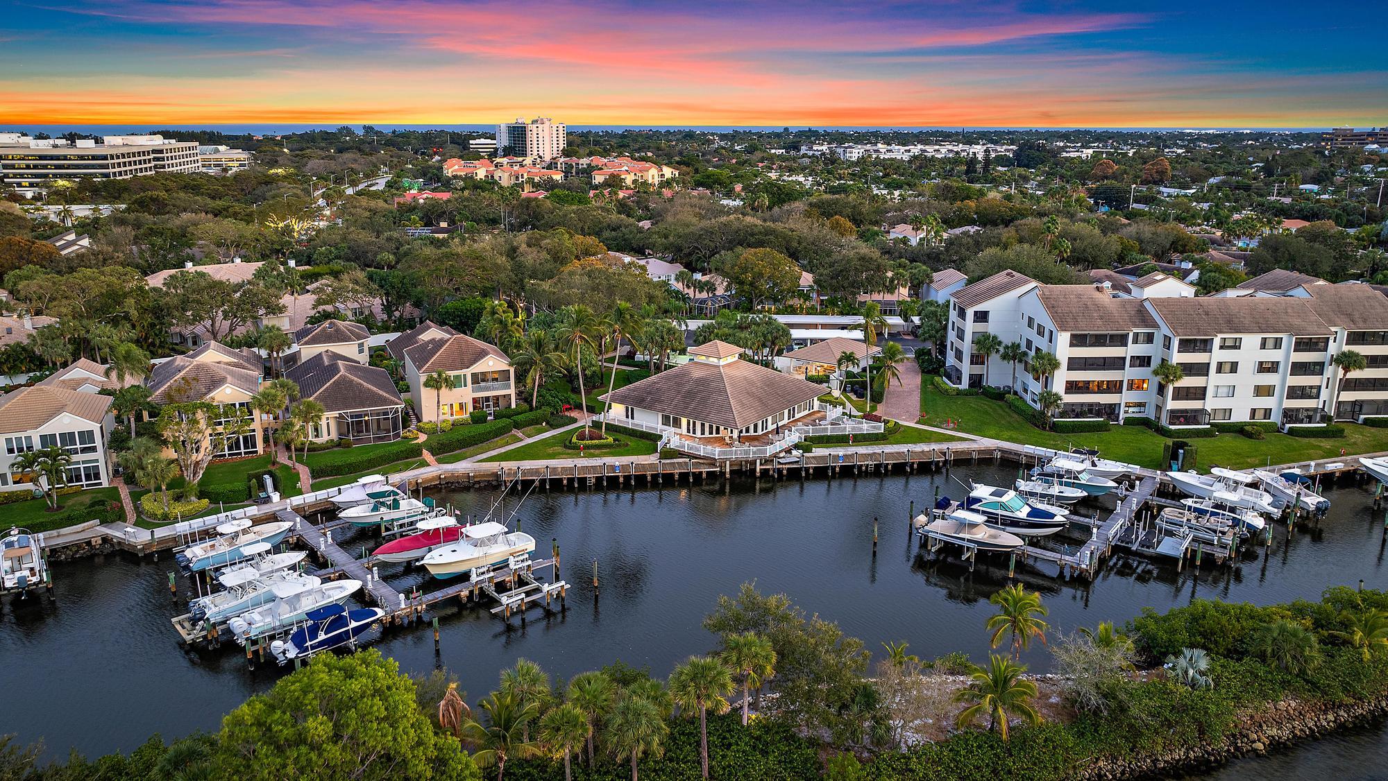 326 Oak Harbour Drive Juno Beach, FL 33408 - Photo 34 of 41 an aerial view of a houses with a lake