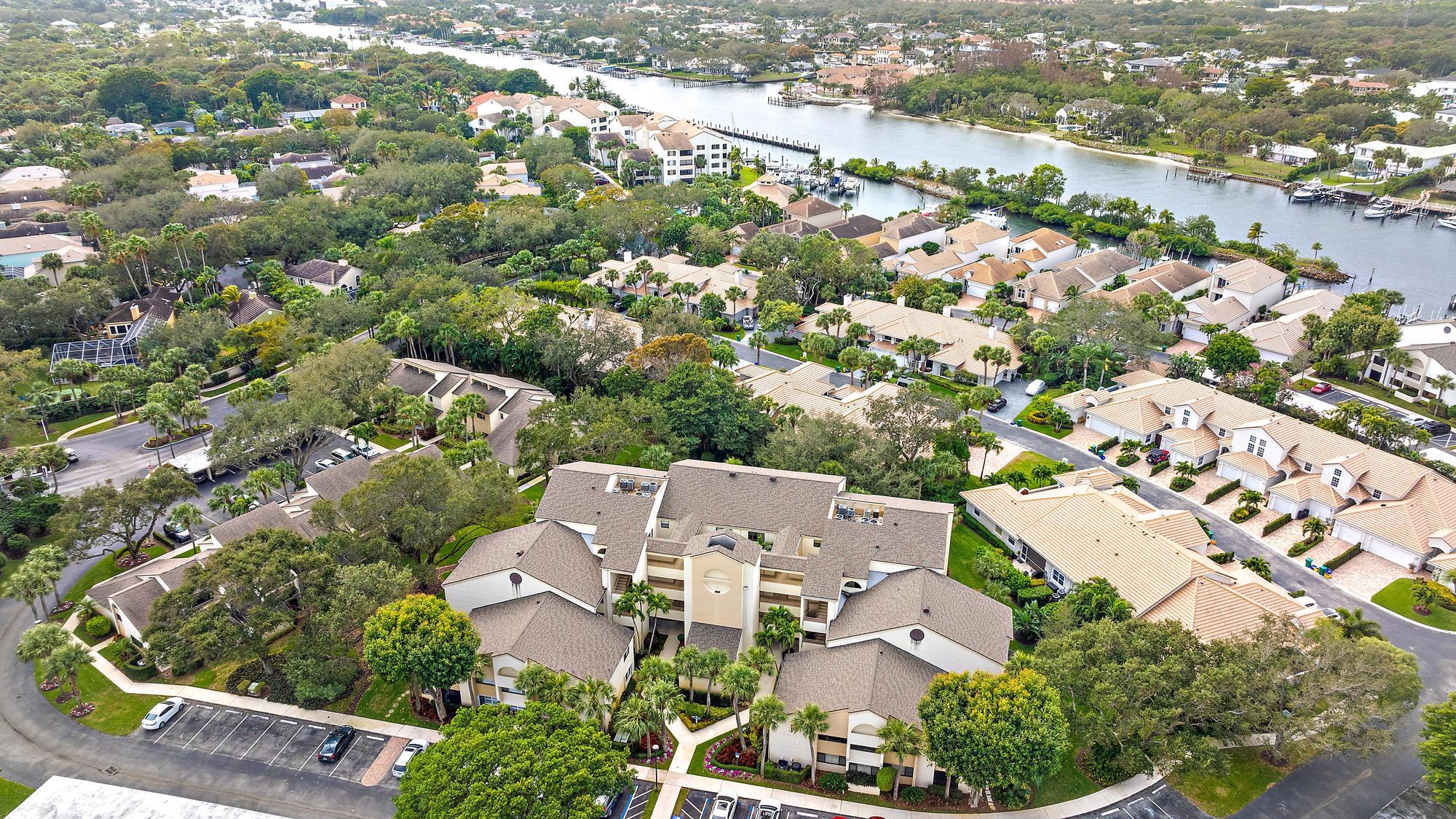 326 Oak Harbour Drive Juno Beach, FL 33408 - Photo 37 of 41 an aerial view of a city with lots of residential buildings