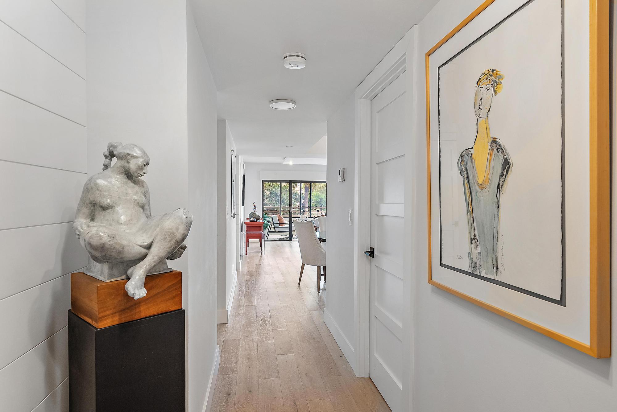 326 Oak Harbour Drive Juno Beach, FL 33408 - Photo 4 of 41 a view of hallway with chandelier