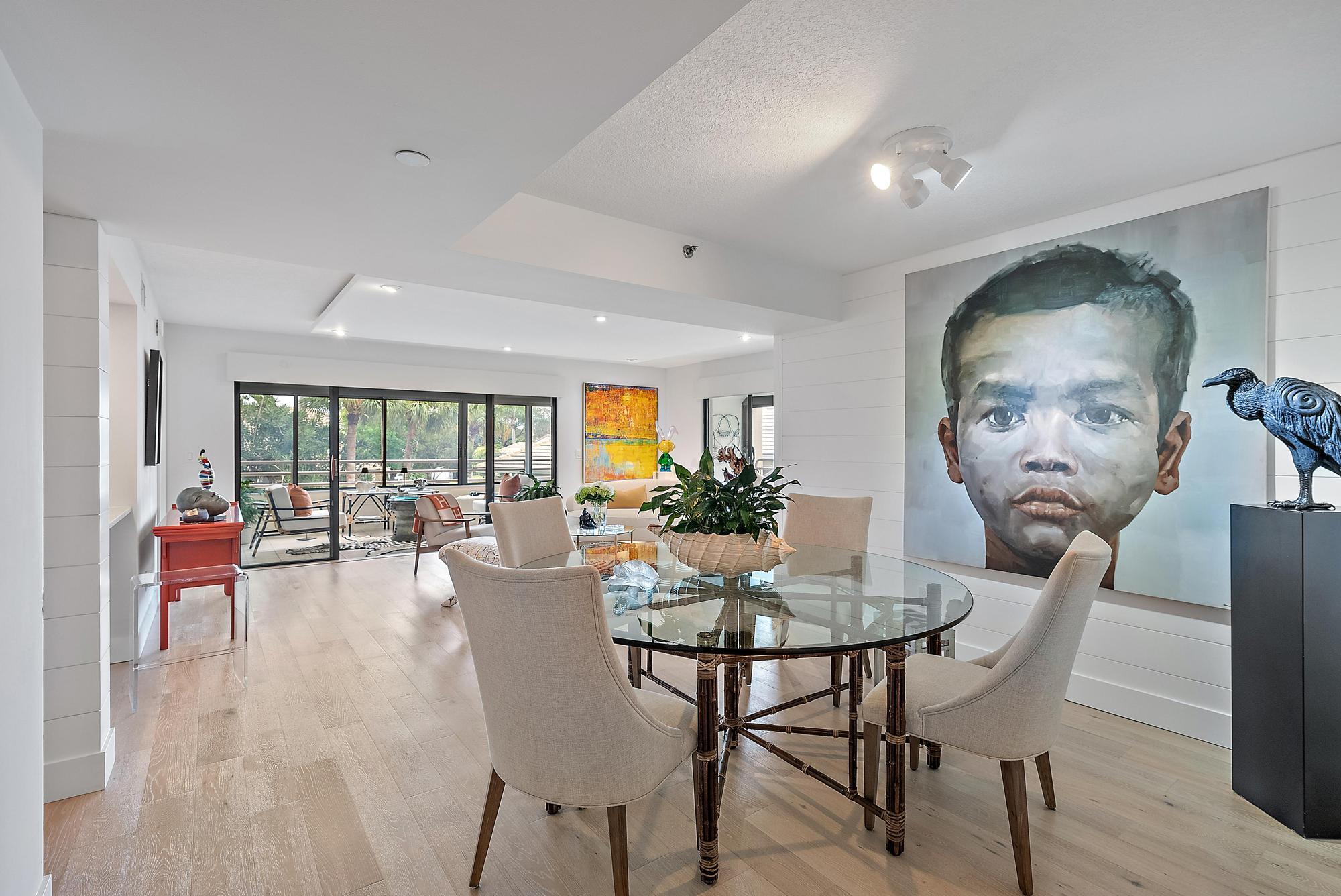 326 Oak Harbour Drive Juno Beach, FL 33408 - Photo 6 of 41 a view of a dining room with furniture window and outside view