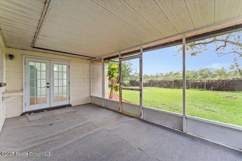 1527 Spruce Road Melbourne, FL 32935 - Photo 4 of 24 screened back porch