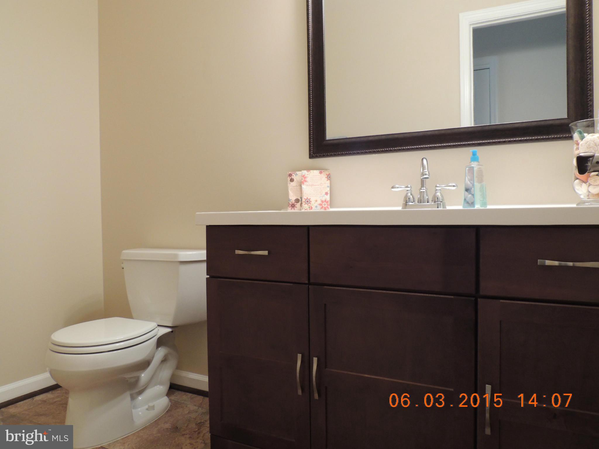 7419 Garrison Road Manassas, VA 20111 - Photo 11 of 30 Main level half bath