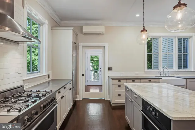 a view of entryway with wooden floor