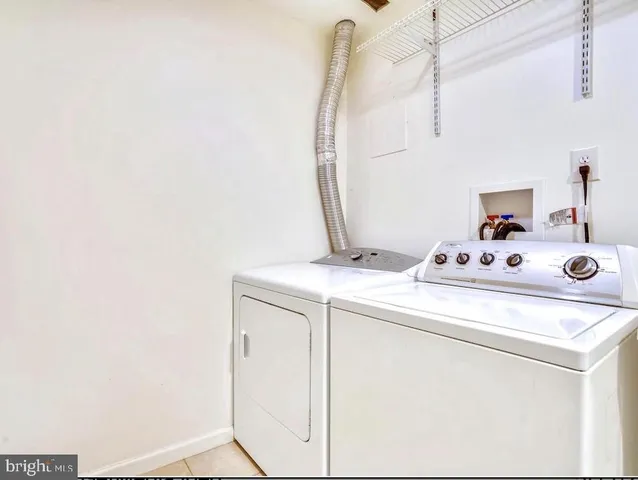 a front view of building with yard