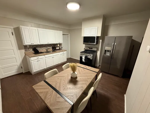 a view of entryway with a front door