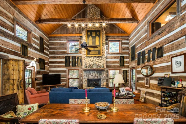a open kitchen with stainless steel appliances granite countertop a stove and a refrigerator