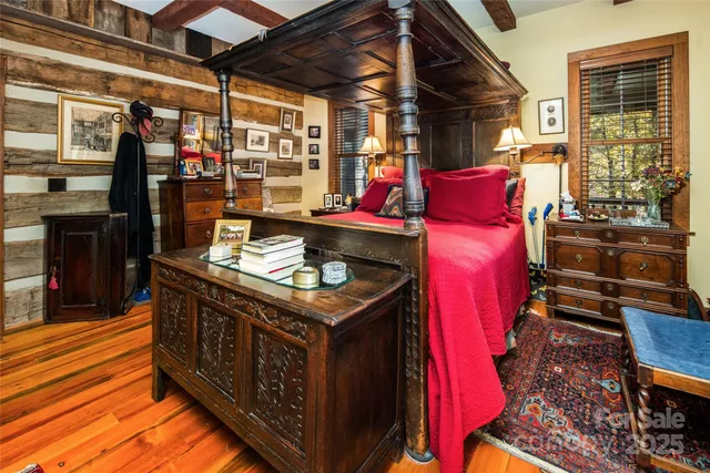 a backyard of a house with lots of green space and garden