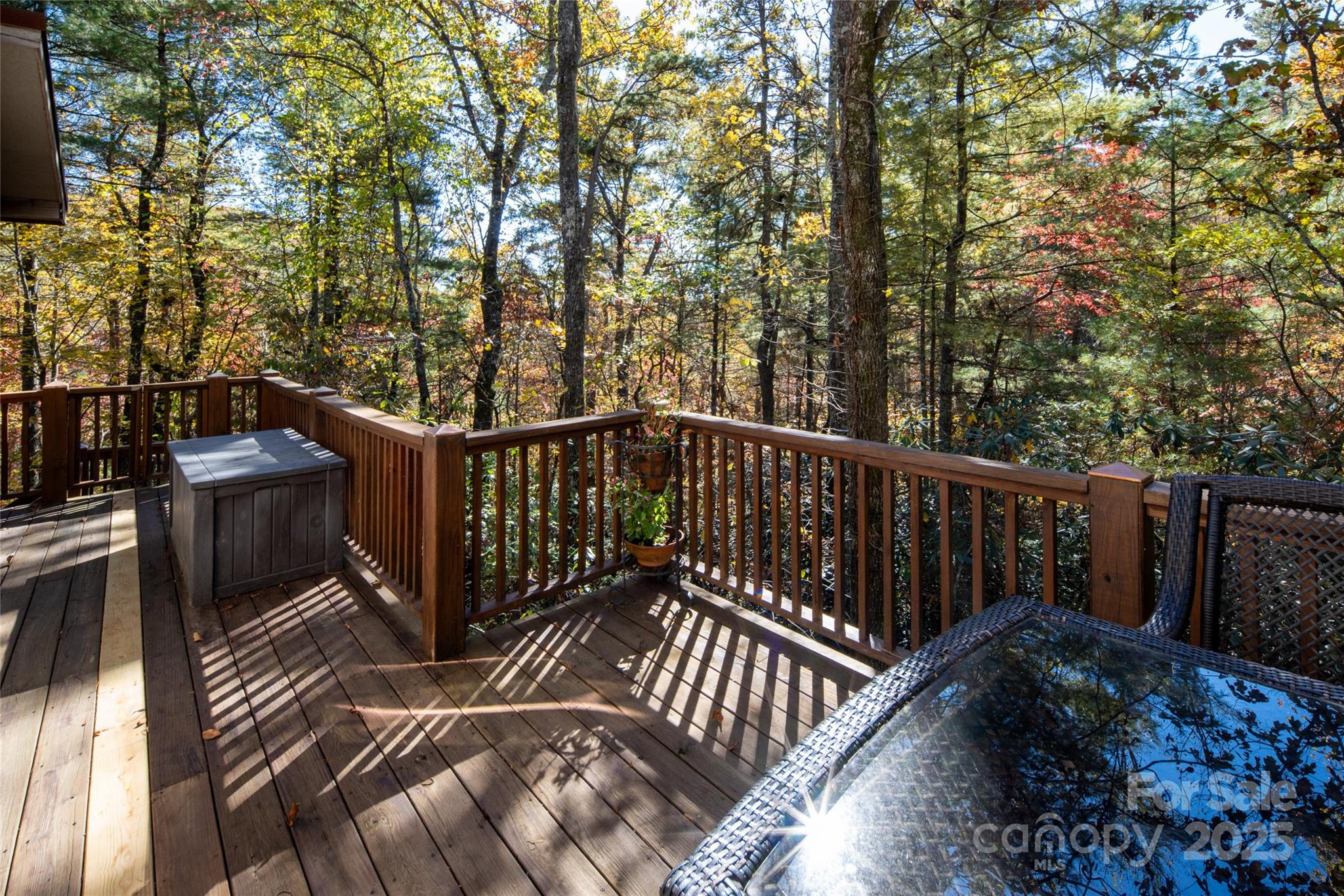 69 Dogwood Branch Road Zirconia, NC 28790 - Photo 40 of 48 a view of balcony with wooden floor and fence