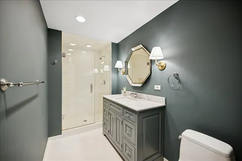 a view of a house with a big yard and a large tree