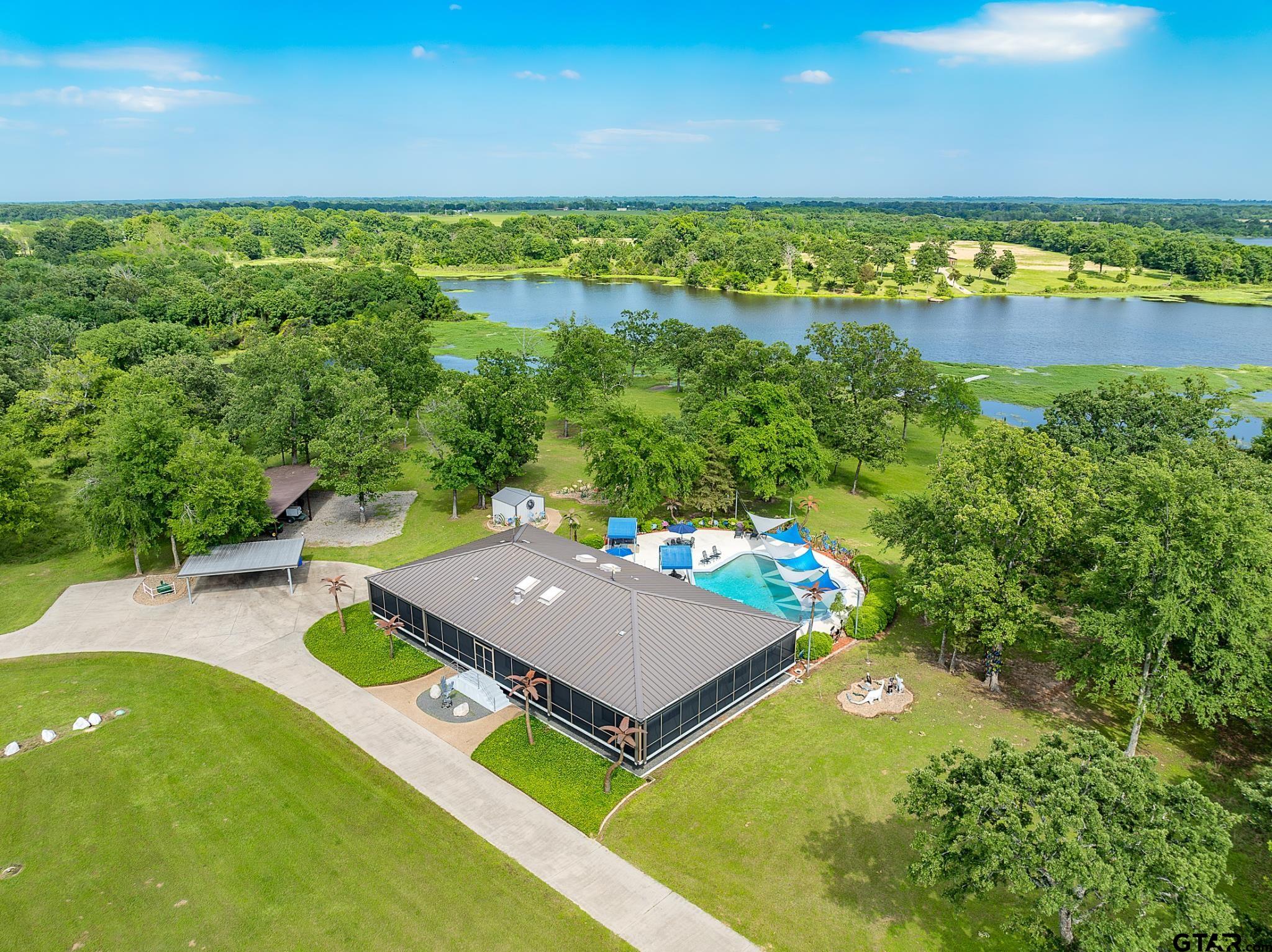1085 County Road 1960 Yantis, TX 75497 - Photo 13 of 41 a view of an outdoor space and yard