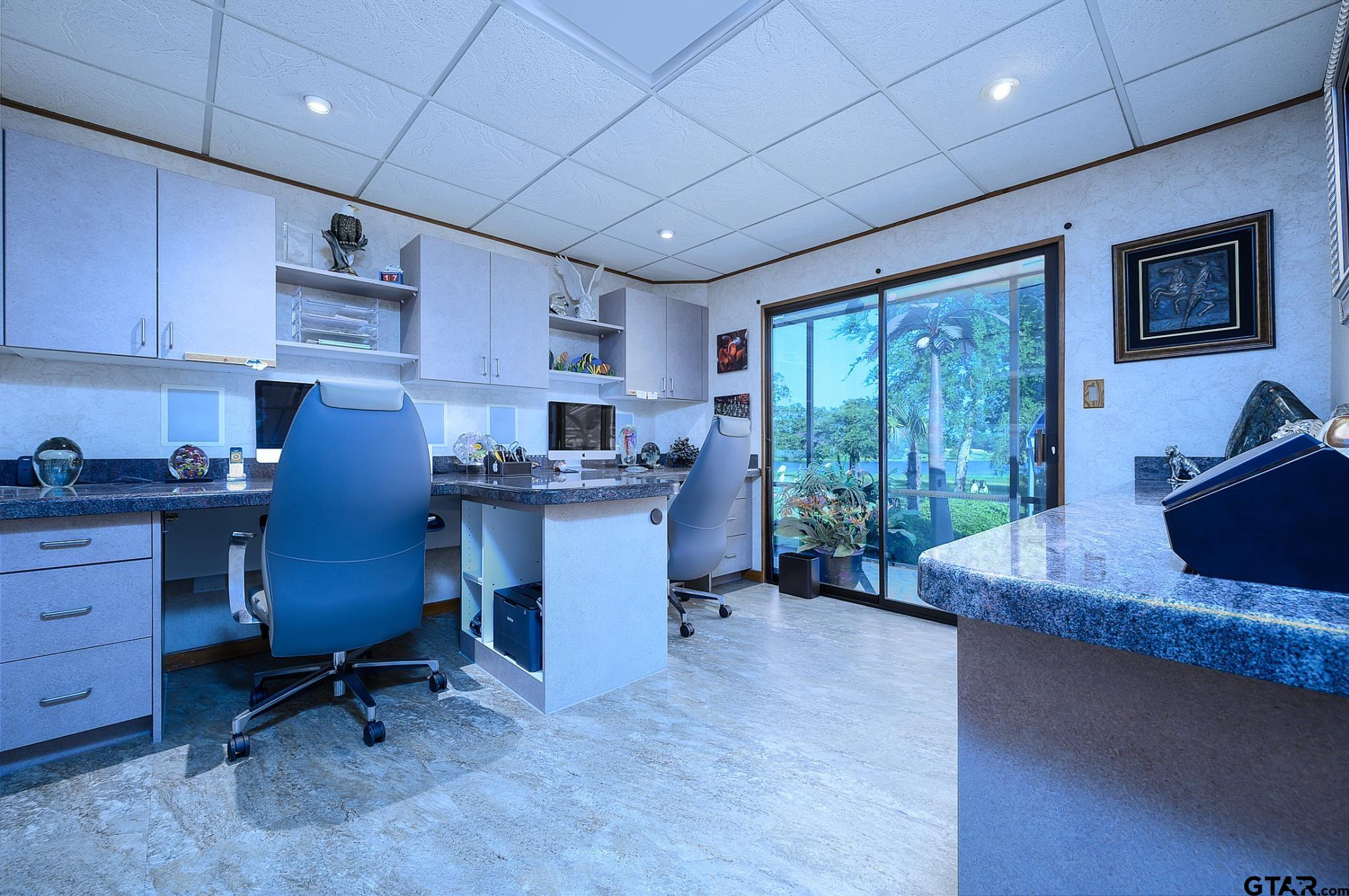 1085 County Road 1960 Yantis, TX 75497 - Photo 21 of 41 a kitchen with cabinets table and chairs