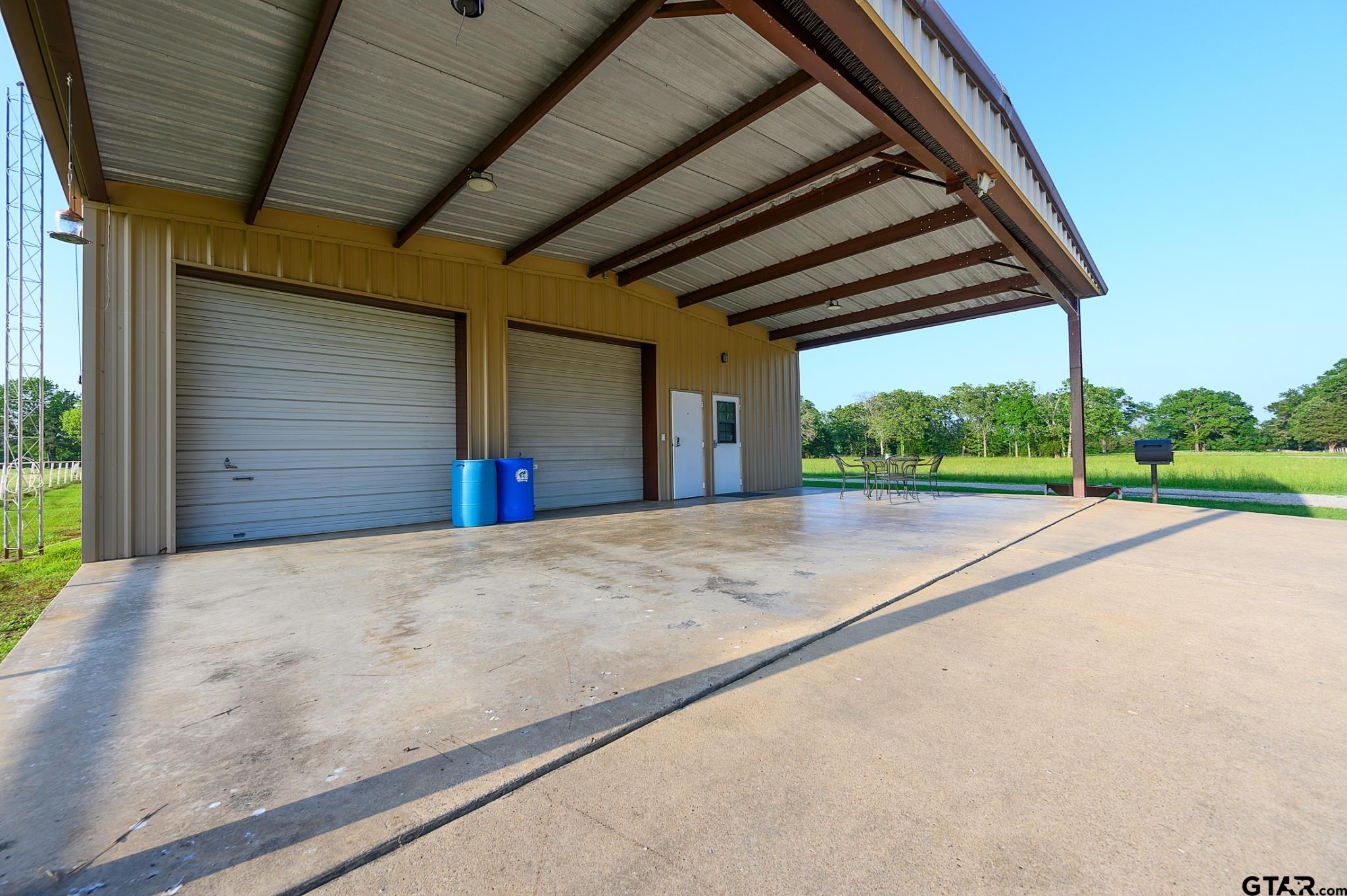 1085 County Road 1960 Yantis, TX 75497 - Photo 34 of 41 a view of outdoor space and garage