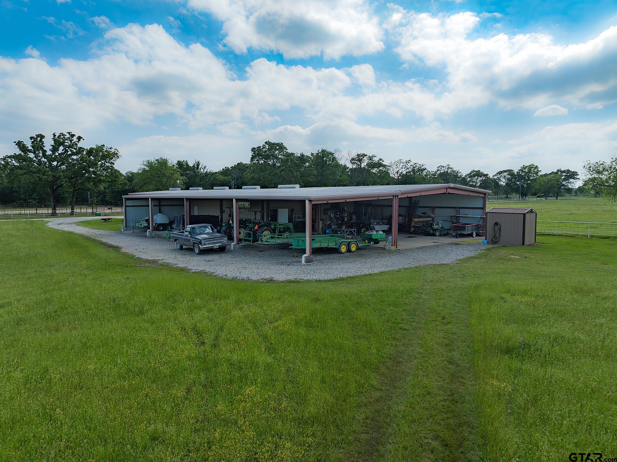 1085 County Road 1960 Yantis, TX 75497 - Photo 37 of 41 a view of a house with a backyard