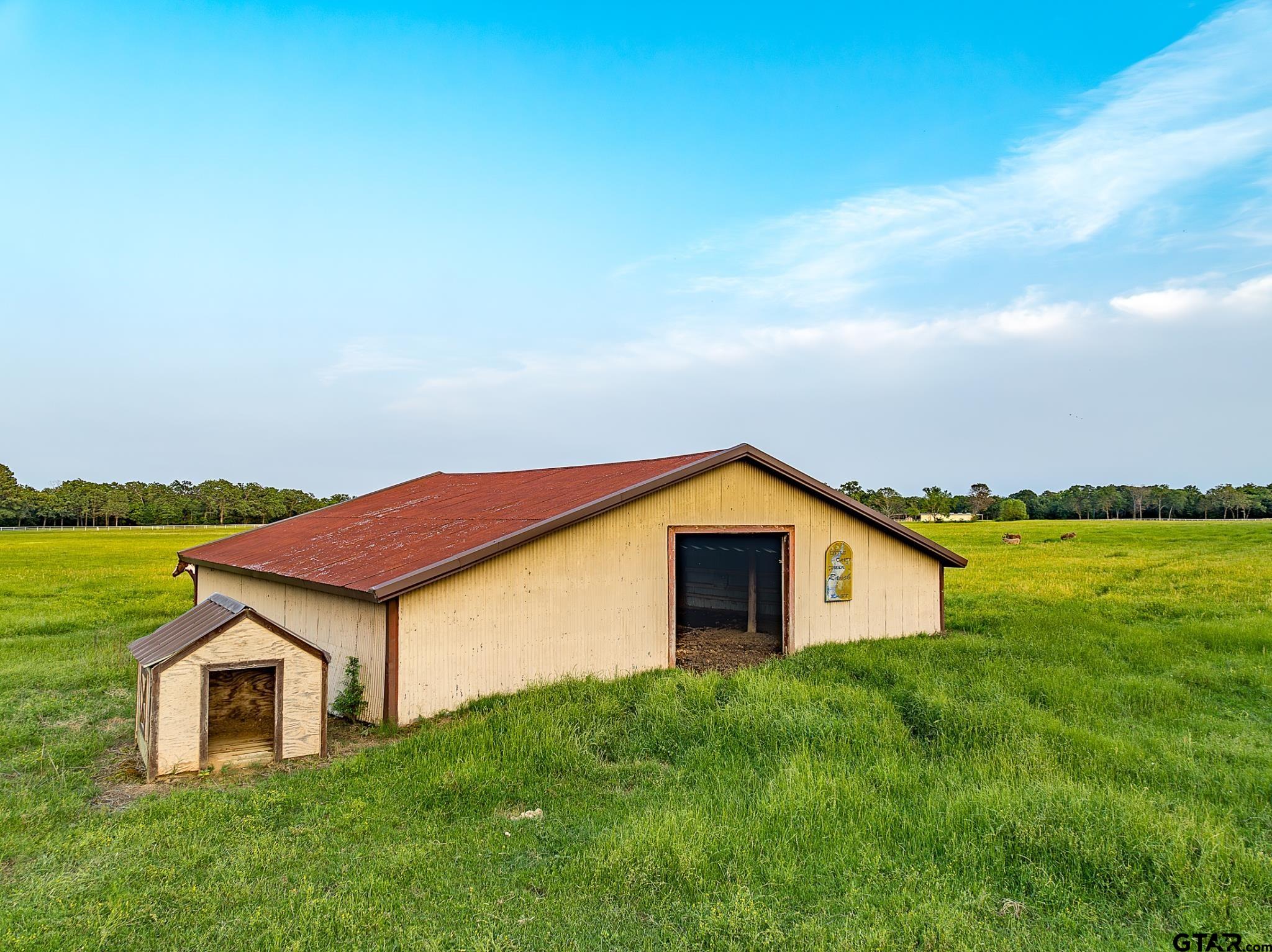 1085 County Road 1960 Yantis, TX 75497 - Photo 38 of 41 a view of a house with a yard