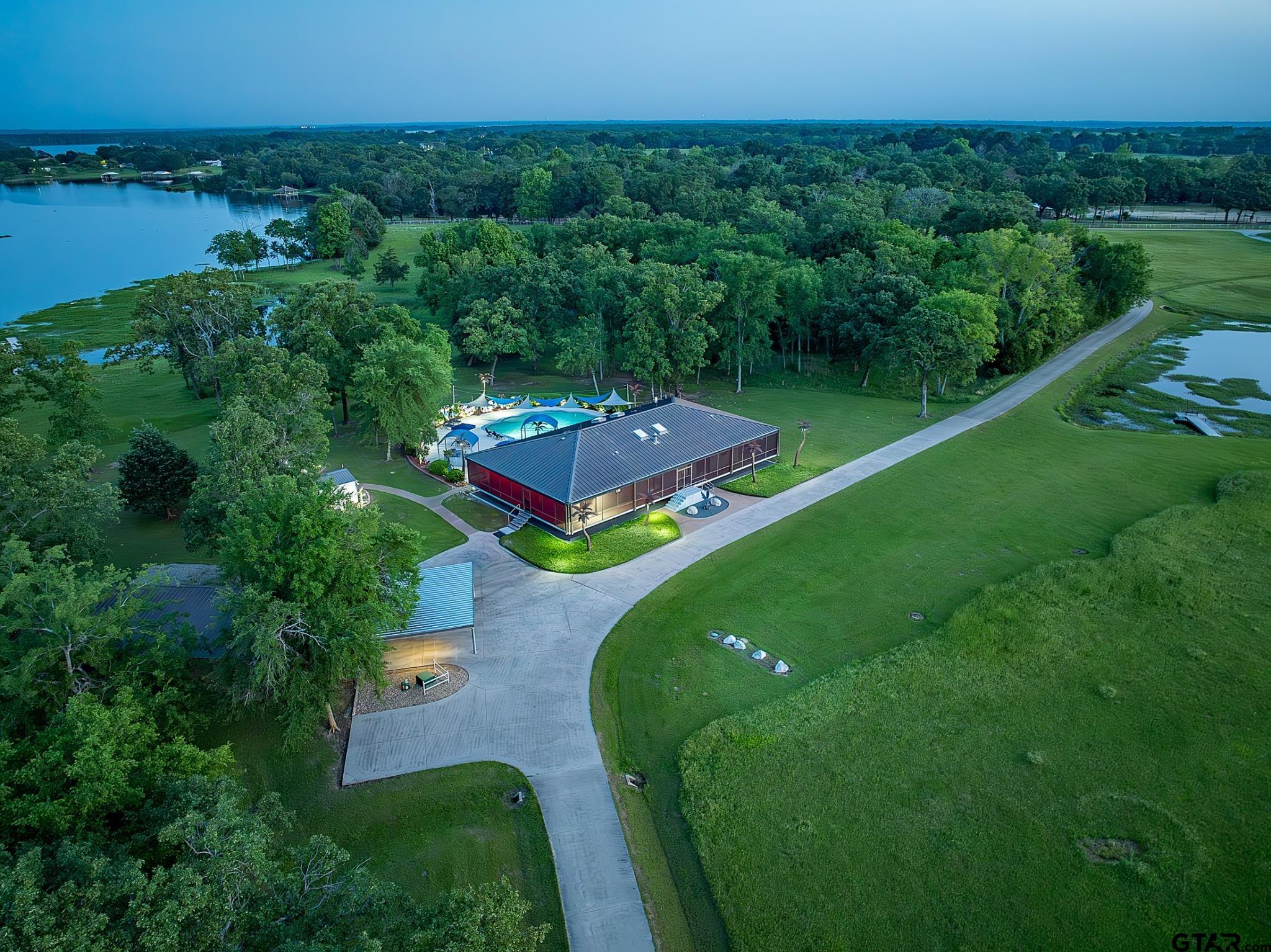 1085 County Road 1960 Yantis, TX 75497 - Photo 9 of 41 an aerial view of a house