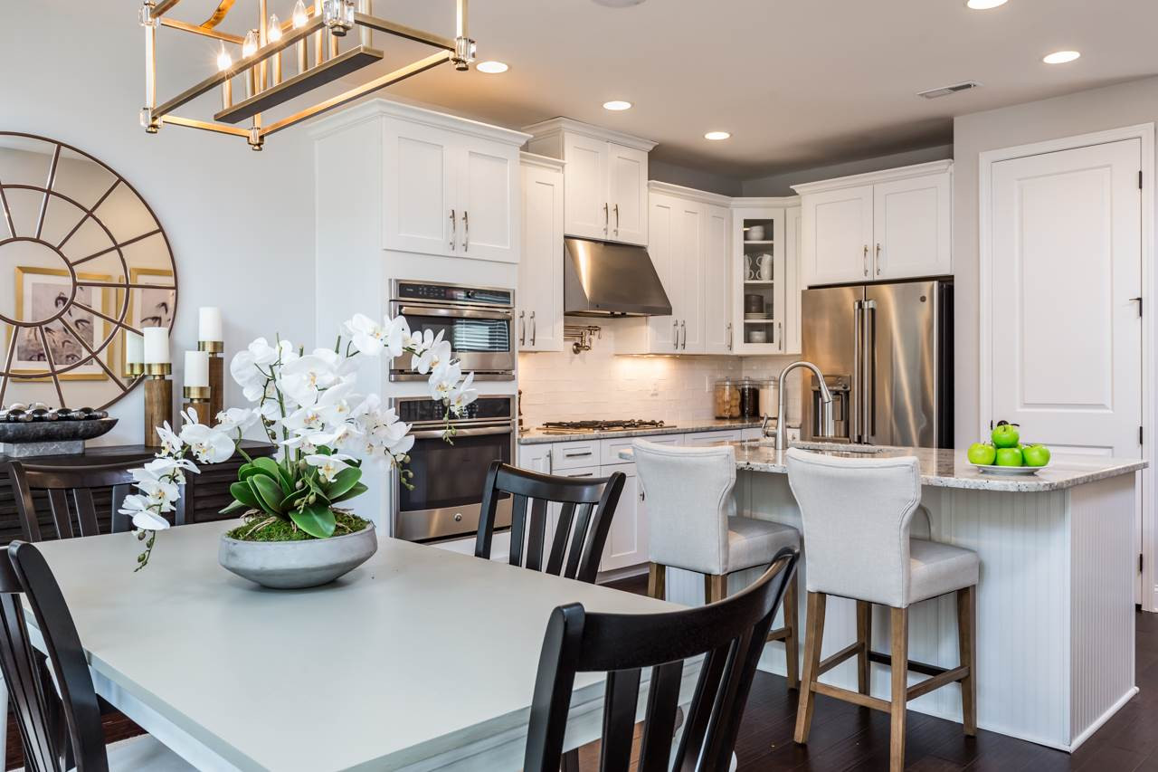 Picture is of similar home in neighborhood. Kitchen