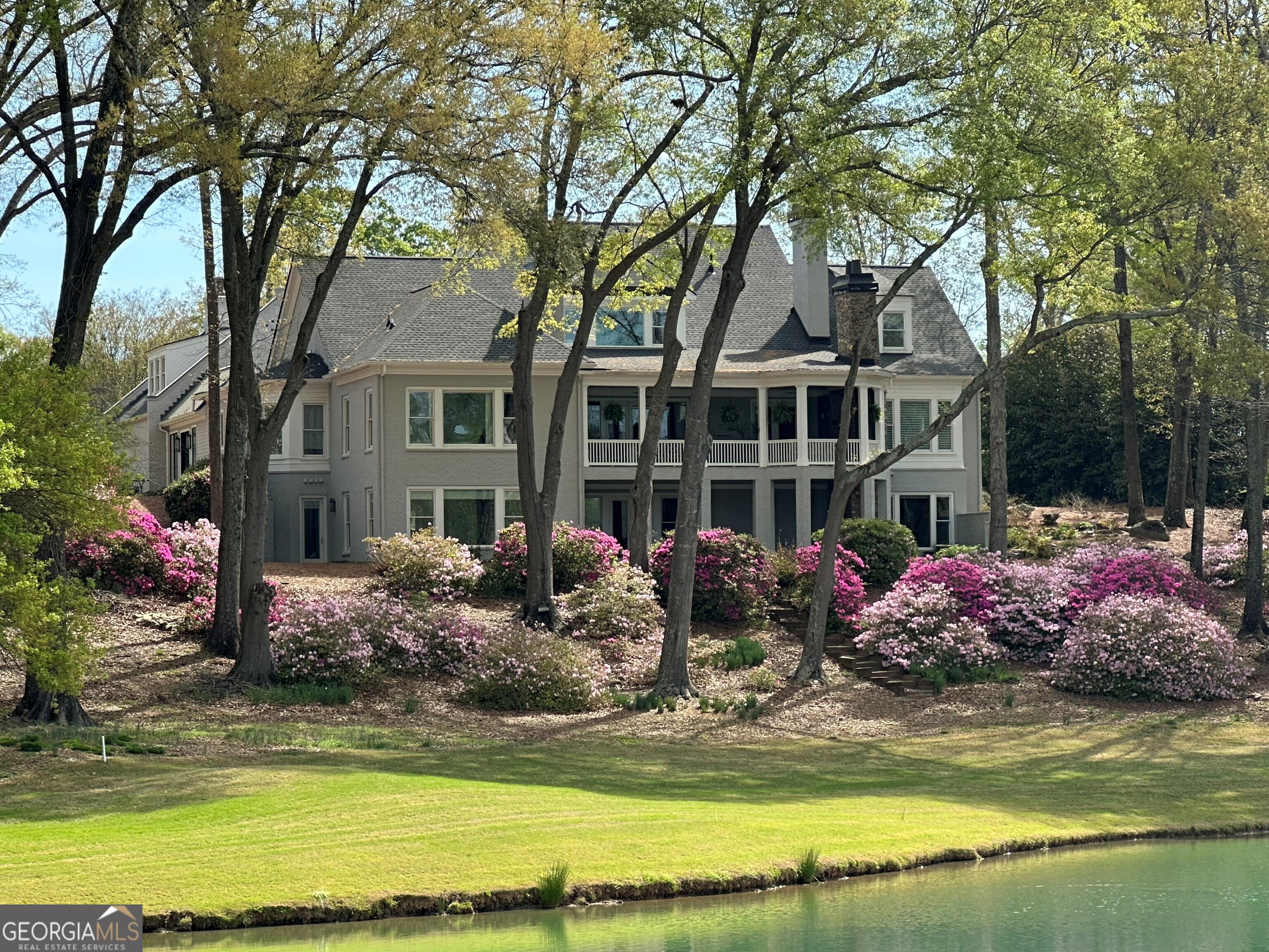 711 Bluff Road Statham, GA 30666 - Photo 11 of 79 a front view of house with yard space and swimming pool