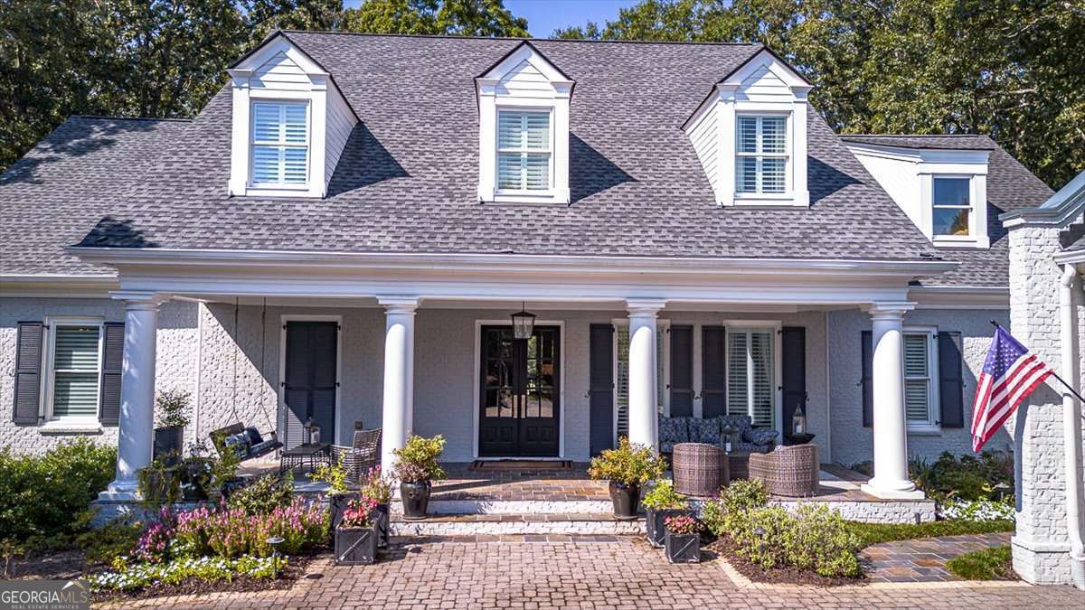 711 Bluff Road Statham, GA 30666 - Photo 2 of 70 front view of a house with potted plants