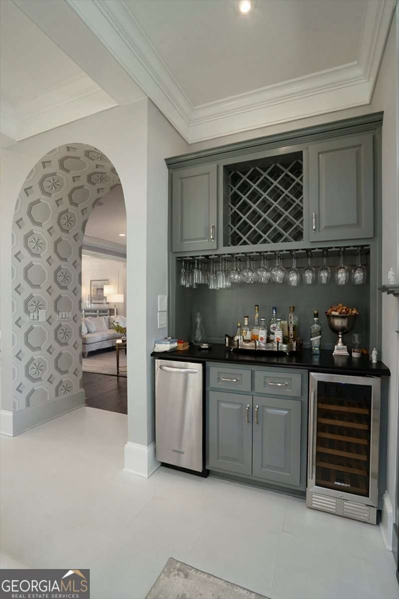 711 Bluff Road Statham, GA 30666 - Photo 21 of 70 a kitchen with stainless steel appliances a stove a sink and a microwave