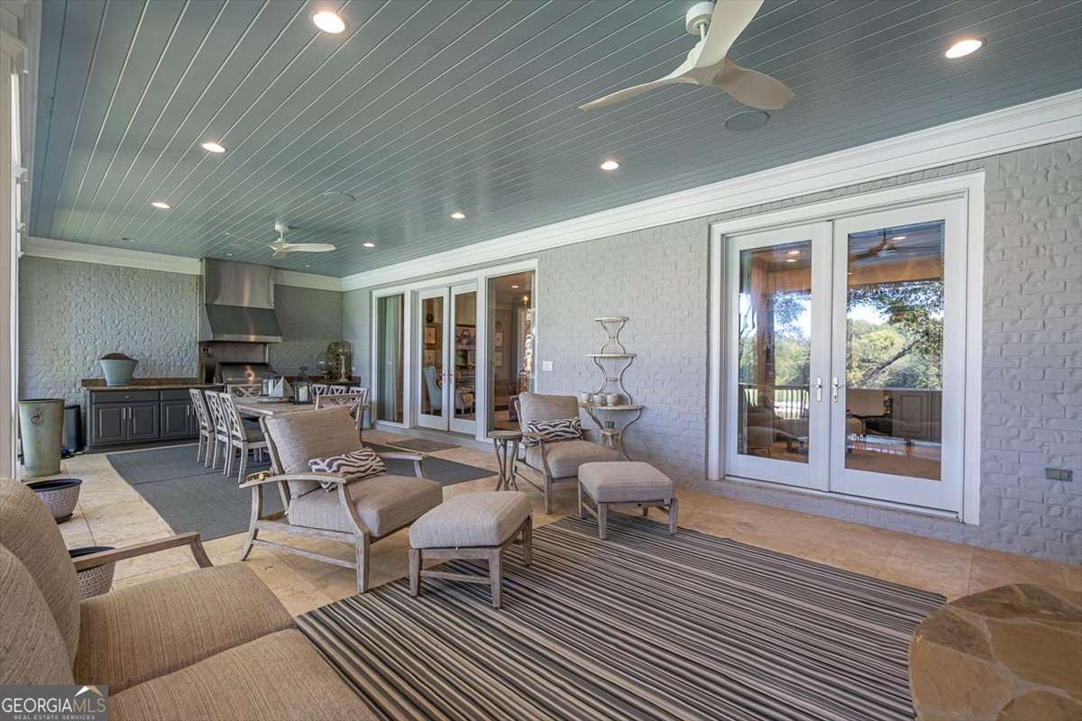 711 Bluff Road Statham, GA 30666 - Photo 23 of 79 a living room with furniture and a table