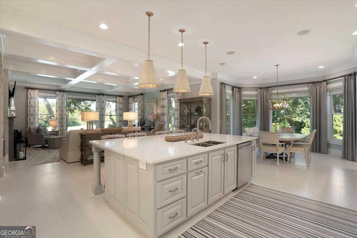 711 Bluff Road Statham, GA 30666 - Photo 24 of 70 a large kitchen with lots of counter space and a sink