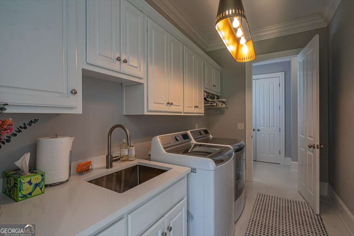 711 Bluff Road Statham, GA 30666 - Photo 37 of 79 a kitchen with sink and cabinets