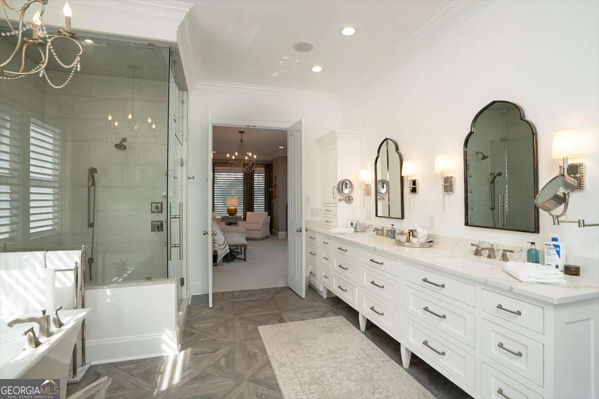 711 Bluff Road Statham, GA 30666 - Photo 38 of 70 a spacious bathroom with a double vanity sink mirror and shower