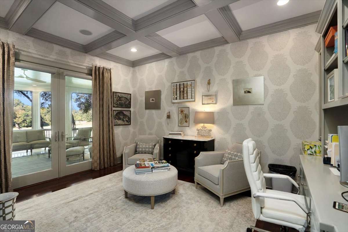 711 Bluff Road Statham, GA 30666 - Photo 43 of 79 a living room with furniture and a large window