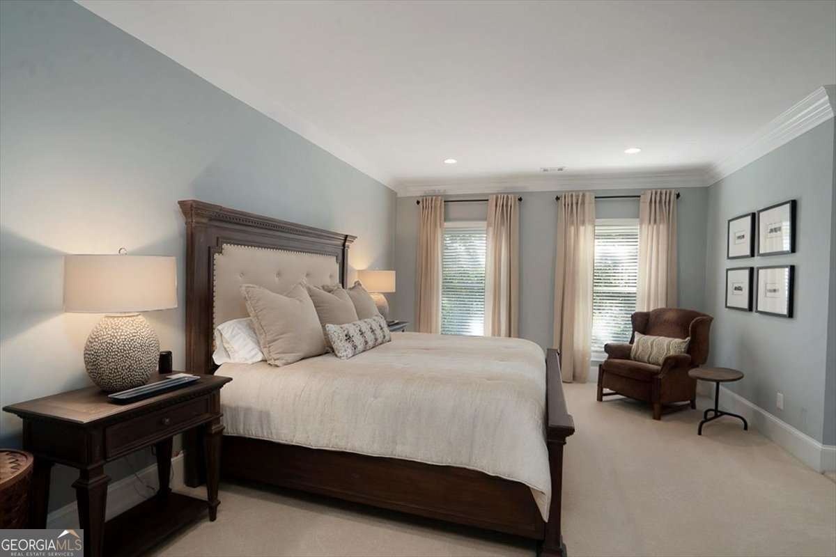 711 Bluff Road Statham, GA 30666 - Photo 55 of 79 a bedroom with a bed and a window