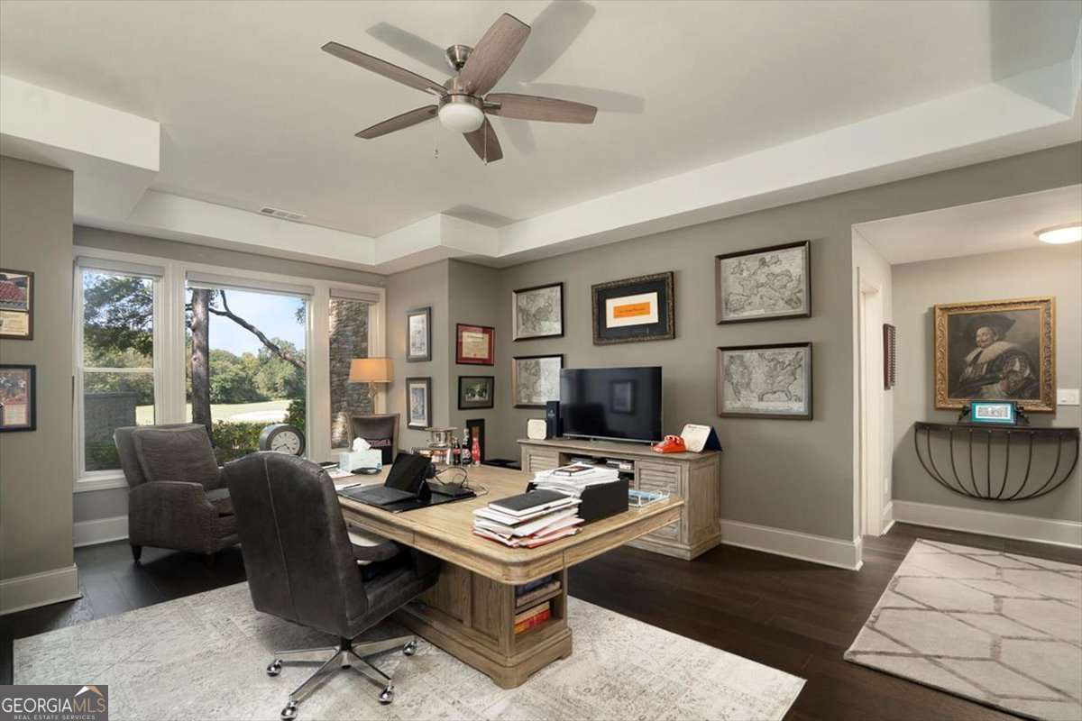 711 Bluff Road Statham, GA 30666 - Photo 62 of 79 a living room with furniture a rug and a window