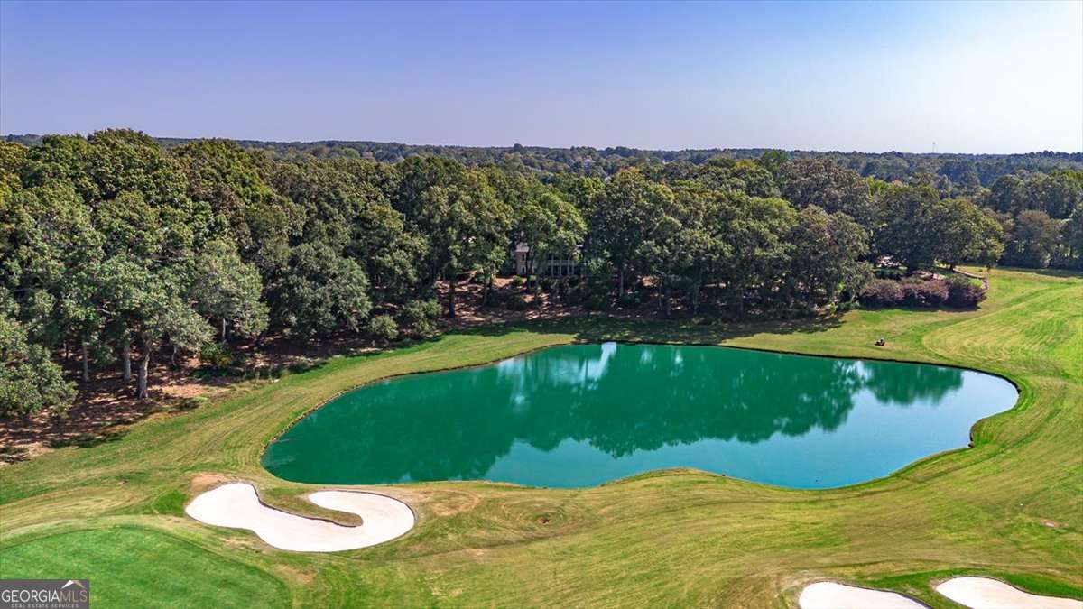 711 Bluff Road Statham, GA 30666 - Photo 77 of 79 a view of a golf course with a garden