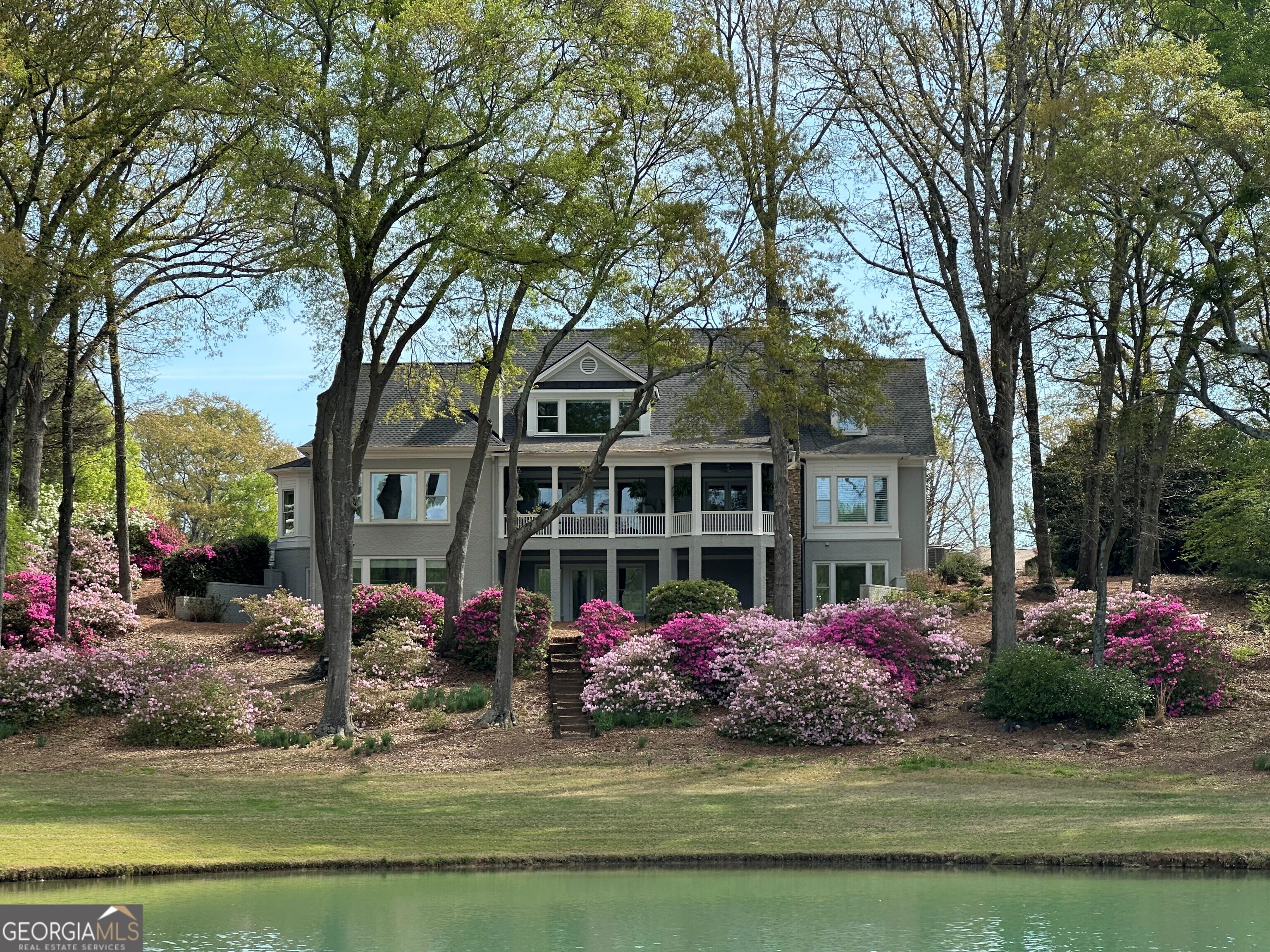 711 Bluff Road Statham, GA 30666 - Photo 9 of 79 a front view of a house with garden
