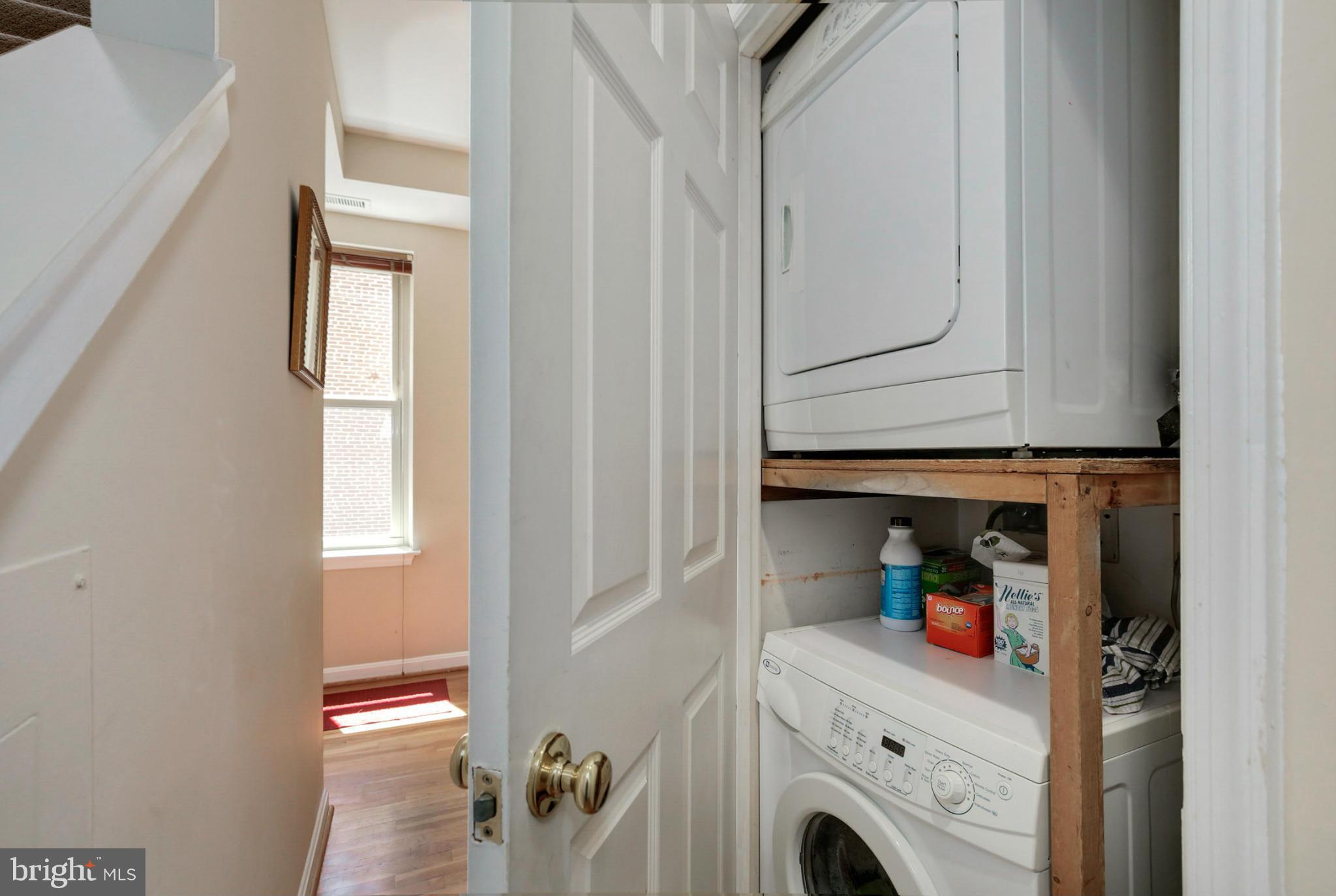1454 Euclid Street Northwest, Unit 7 Washington, DC 20009 - Photo 15 of 23 a storage room with washer and dryer